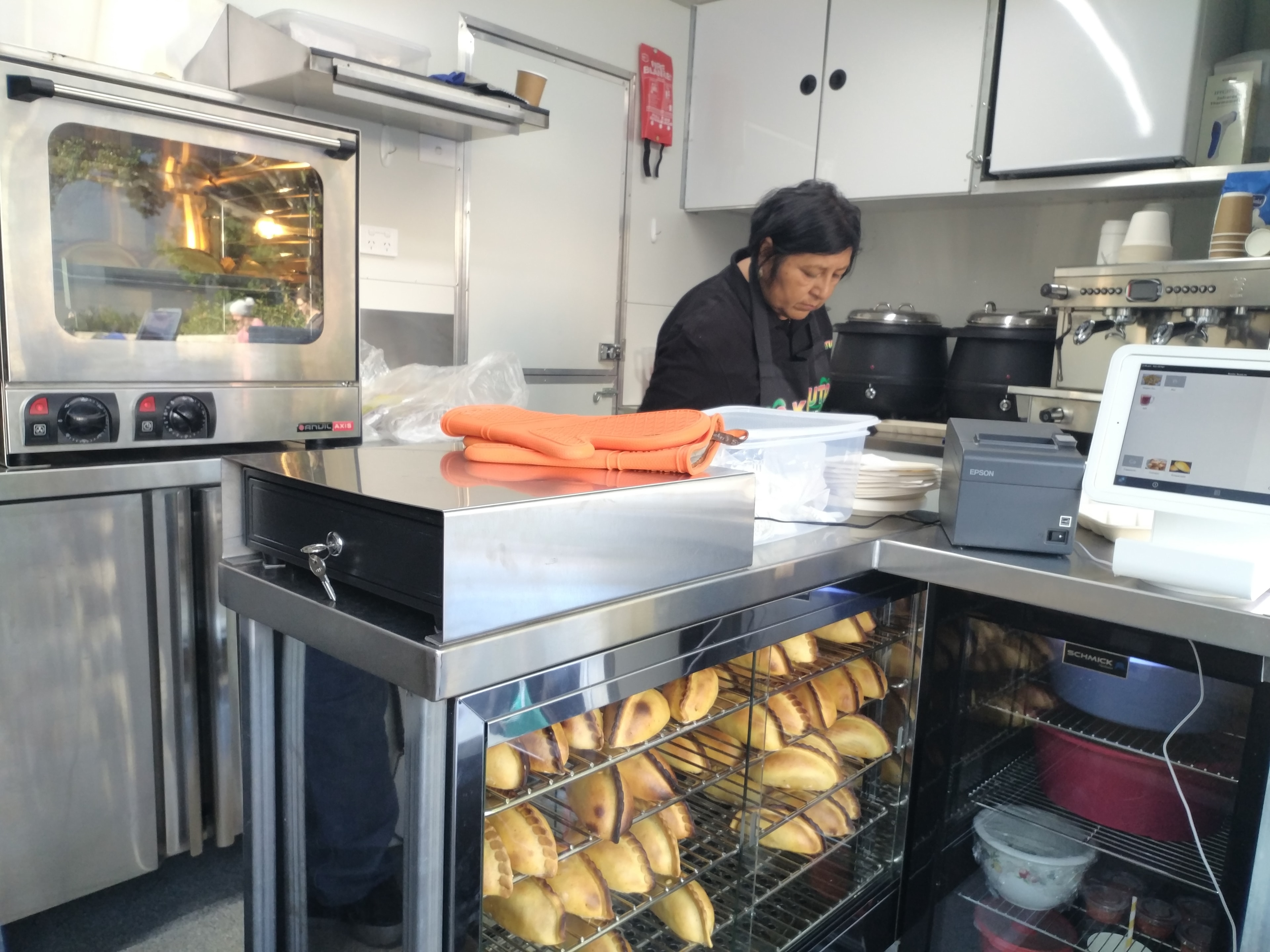 Dorita cooking in her kitchen